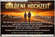 Die Einladung zur Goldenen Hochzeit mit dem Paar vor einem Sonnenuntergang